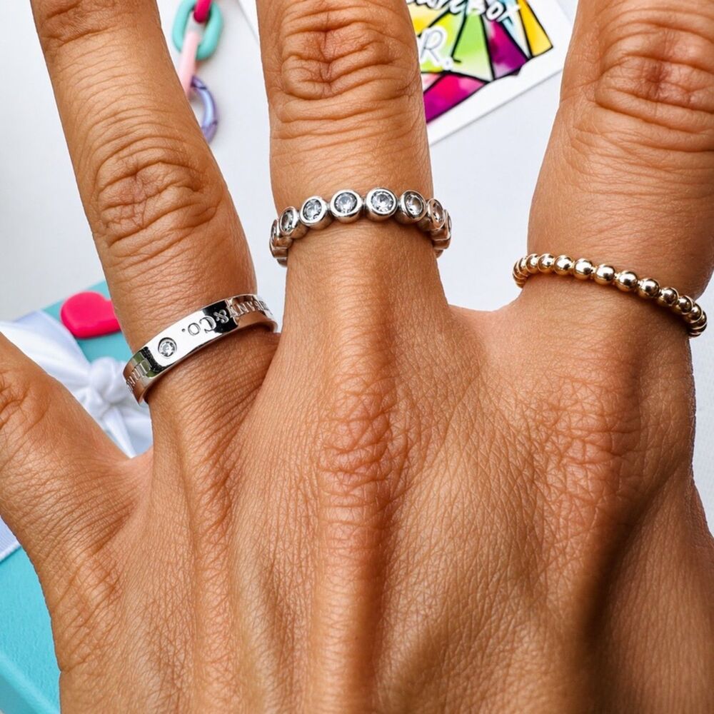 Tiffany & Co. 4mm Band ring in Platinum with Round Brilliant Diamonds, Sz 6.25